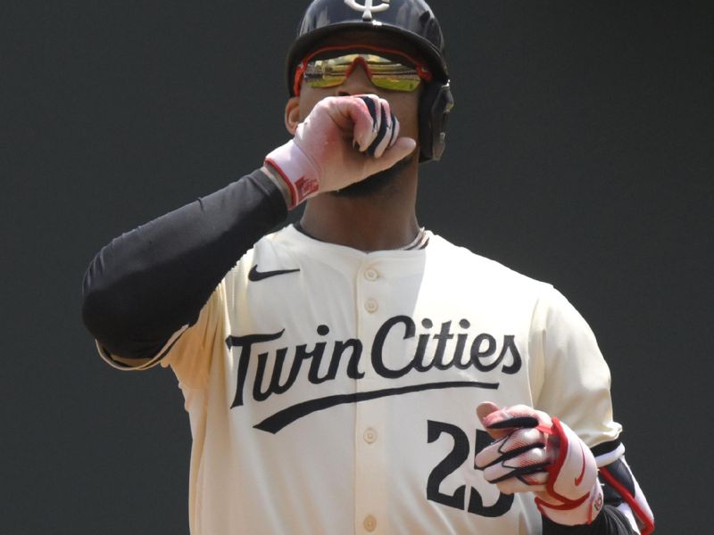 Jul 24, 2024; Minneapolis, Minnesota, USA;  Minnesota Twins outfielder Byron Buxton (25) celebrates after hitting a double against the Philadelphia Phillies during the second inning at Target Field. Mandatory Credit: Nick Wosika-USA TODAY Sports