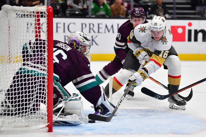 Dec 27, 2023; Anaheim, California, USA; Anaheim Ducks goaltender John Gibson (36) blocks a shot against Vegas Golden Knights left wing Pavel Dorofeyev (16) during the second period at Honda Center. Mandatory Credit: Gary A. Vasquez-USA TODAY Sports