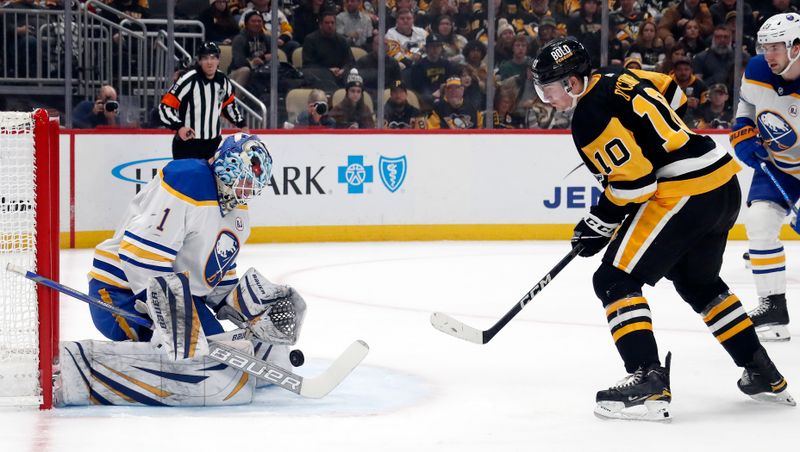 Jan 6, 2024; Pittsburgh, Pennsylvania, USA;  Buffalo Sabres goaltender Ukko-Pekka Luukkonen (1) makes a save against Pittsburgh Penguins left wing Drew O'Connor (10) during the first period at PPG Paints Arena. Mandatory Credit: Charles LeClaire-USA TODAY Sports