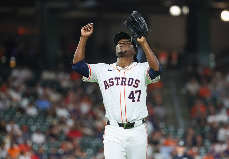 May 1, 2024; Houston, Texas, USA;  Houston Astros pitcher Rafael Montero (47) reacts after pitching during the eighth inning against the Cleveland Guardians at Minute Maid Park. Mandatory Credit: Troy Taormina-USA TODAY Sports