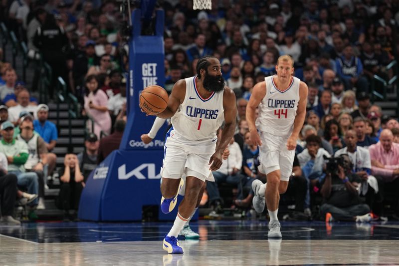 DALLAS, TX - APRIL 28: James Harden #1 of the LA Clippers handles the ball during the game against the Dallas Mavericks during Round 1 Game 4 of the 2024NBA Playoffs on April 28, 2024 at the American Airlines Center in Dallas, Texas. NOTE TO USER: User expressly acknowledges and agrees that, by downloading and or using this photograph, User is consenting to the terms and conditions of the Getty Images License Agreement. Mandatory Copyright Notice: Copyright 2024 NBAE (Photo by Glenn James/NBAE via Getty Images)