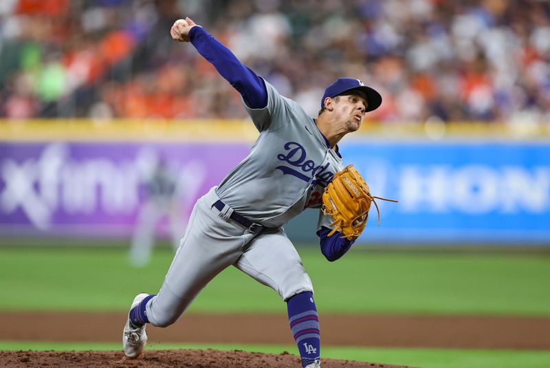 Jul 26, 2024; Houston, Texas, USA; Los Angeles Dodgers starting pitcher Gavin Stone (35) delivers a pitch during the second inning against the Houston Astros at Minute Maid Park. Mandatory Credit: Troy Taormina-USA TODAY Sports