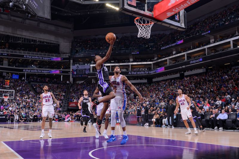 SACRAMENTO, CA - MARCH 25:  De'Aaron Fox #5 of the Sacramento Kings goes to the basket during the game on March 25, 2024 at Golden 1 Center in Sacramento, California. NOTE TO USER: User expressly acknowledges and agrees that, by downloading and or using this Photograph, user is consenting to the terms and conditions of the Getty Images License Agreement. Mandatory Copyright Notice: Copyright 2024 NBAE (Photo by Rocky Widner/NBAE via Getty Images)