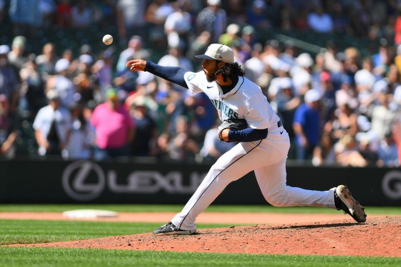 Jul 4, 2024; Seattle, Washington, USA; Seattle Mariners relief pitcher Andres Munoz (75) pitches to the Baltimore Orioles during the ninth inning at T-Mobile Park. Mandatory Credit: Steven Bisig-USA TODAY Sports