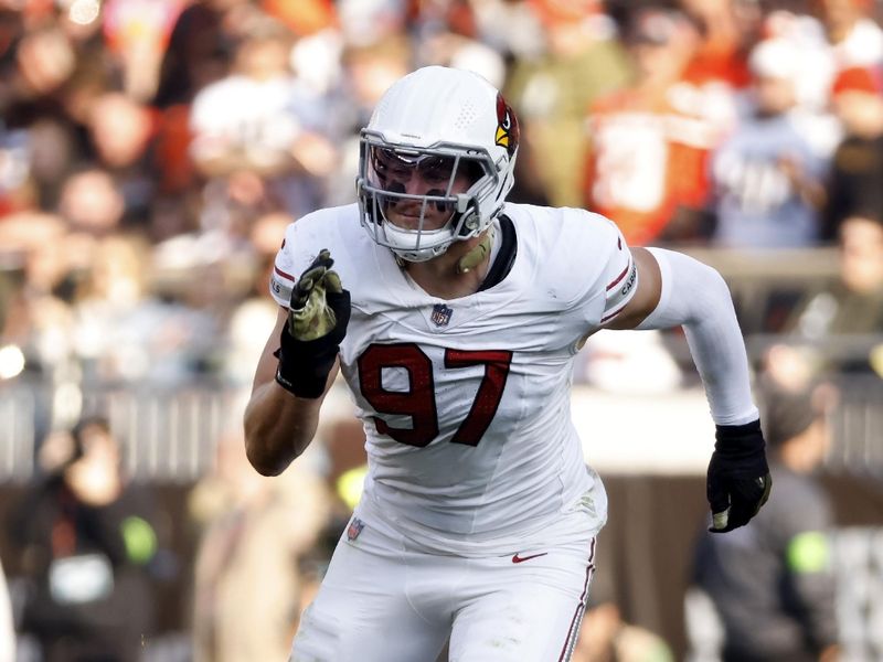 Arizona Cardinals outside linebacker Cameron Thomas (97) runs off of the line of scrimmage during an NFL football game against the Cleveland Browns, Sunday, Nov. 5, 2023, in Cleveland. (AP Photo/Kirk Irwin)