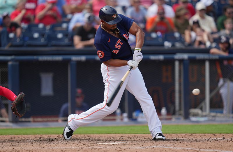 Mar 14, 2023; West Palm Beach, Florida, USA;  Houston Astros first baseman Jose Abreu (79) hits a double in the sixth inning against the St. Louis Cardinals at The Ballpark of the Palm Beaches. Mandatory Credit: Jim Rassol-USA TODAY Sports