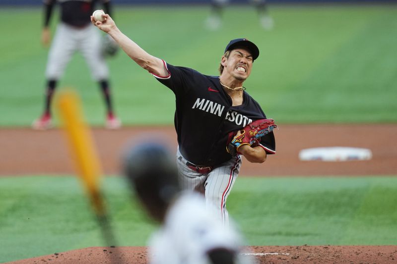 Apr 4, 2023; Miami, Florida, USA;  Minnesota Twins starting pitcher Kenta Maeda (18) pitches to Miami Marlins center fielder Jazz Chisholm Jr. (2) in the second inning at loanDepot Park. Mandatory Credit: Jim Rassol-USA TODAY Sports