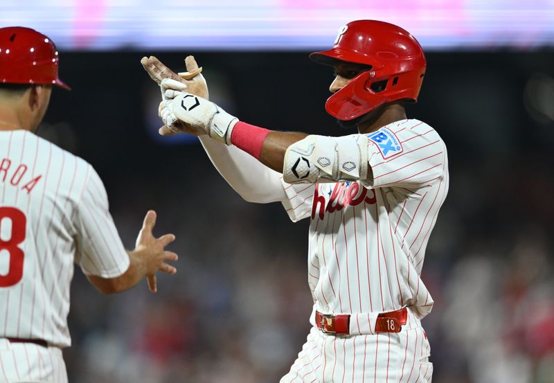 Aug 17, 2024; Philadelphia, Pennsylvania, USA; Philadelphia Phillies outfielder Johan Rojas (18) reacts after hitting an RBI single against the Washington Nationals in the sixth inning at Citizens Bank Park. Mandatory Credit: Kyle Ross-USA TODAY Sports