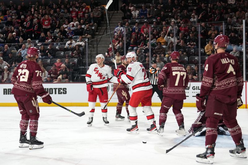 Mar 3, 2023; Tempe, Arizona, USA; Carolina Hurricanes center Paul Stastny (26) celebrates his goal against the Arizona Coyotes during the first period at Mullett Arena. Mandatory Credit: Joe Camporeale-USA TODAY Sports