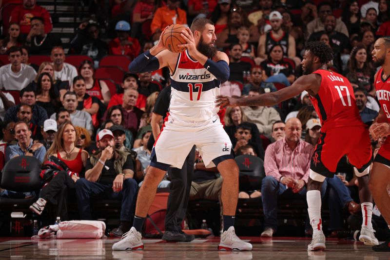 HOUSTON, TX - NOVEMBER 11: Jonas Valanciunas #17 of the Washington Wizards handles the ball during the game against the Houston Rockets on November 11, 2024 at the Toyota Center in Houston, Texas. NOTE TO USER: User expressly acknowledges and agrees that, by downloading and or using this photograph, User is consenting to the terms and conditions of the Getty Images License Agreement. Mandatory Copyright Notice: Copyright 2024 NBAE (Photo by KeShawn Ennis/NBAE via Getty Images)