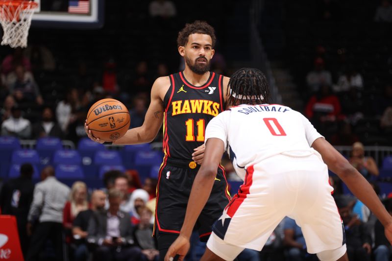 WASHINGTON, DC -? OCTOBER 30: Trae Young #11 of the Atlanta Hawks dribbles the ball during the game against the Washington Wizards during a regular season game on October 30, 2024 at Capital One Arena in Washington, DC. NOTE TO USER: User expressly acknowledges and agrees that, by downloading and or using this Photograph, user is consenting to the terms and conditions of the Getty Images License Agreement. Mandatory Copyright Notice: Copyright 2024 NBAE (Photo by Kenny Giarla/NBAE via Getty Images)