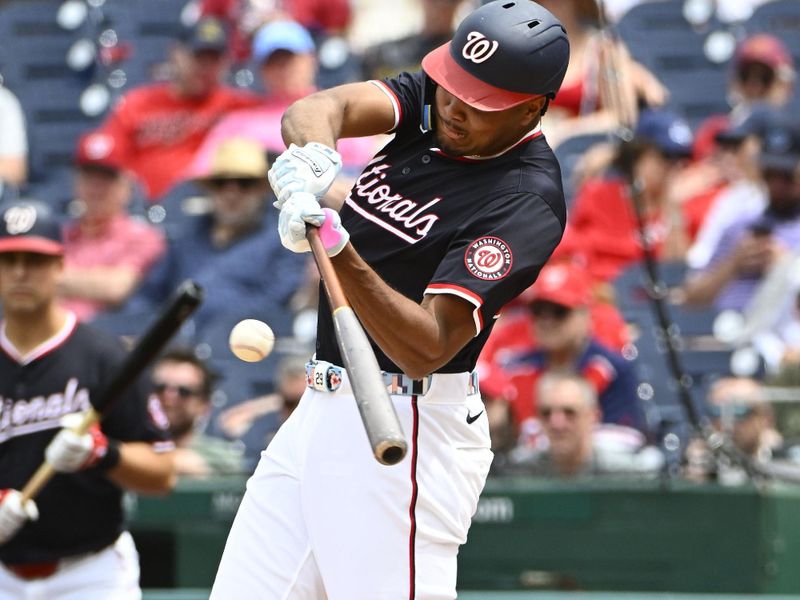 May 7, 2025; Washington, District of Columbia, USA; Washington Nationals designated hitter James Wood (29) doubles against the Cleveland Guardians during the seventh inning at Nationals Park. Mandatory Credit: Brad Mills-Imagn Images