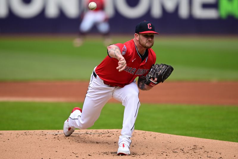 Apr 13, 2025; Cleveland, Ohio, USA; Cleveland Guardians starting pitcher Ben Lively (39) throws a pitch during the first inning against the Kansas City Royals at Progressive Field. Mandatory Credit: David Dermer-Imagn Images