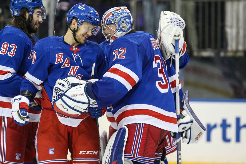 Dec 3, 2023; New York, New York, USA;  New York Rangers left wing Artemi Panarin (10) celebrates with goaltender Jonathan Quick (32) after defeating the San Jose Sharks 6-5 at Madison Square Garden. Mandatory Credit: Wendell Cruz-USA TODAY Sports