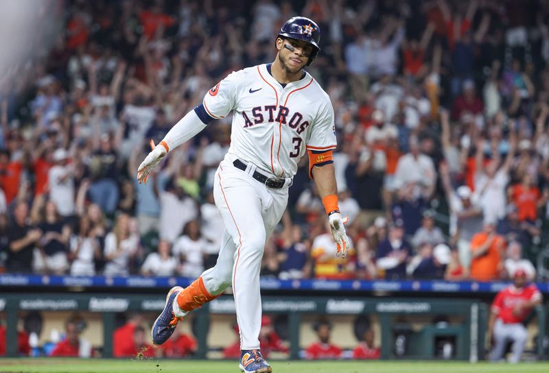 May 21, 2024; Houston, Texas, USA; Houston Astros shortstop Jeremy Pena (3) reacts after hitting a walk-off RBI single during the tenth inning against the Los Angeles Angels at Minute Maid Park. Mandatory Credit: Troy Taormina-USA TODAY Sports