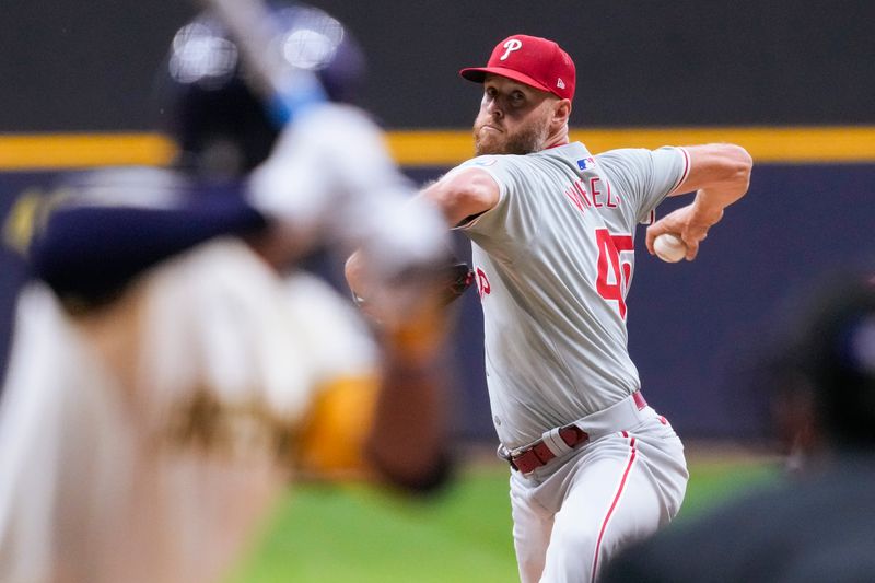 Sep 17, 2024; Milwaukee, Wisconsin, USA;  Philadelphia Phillies pitcher Zack Wheeler (45) throws a pitch during the first inning against the Milwaukee Brewers at American Family Field. Mandatory Credit: Jeff Hanisch-Imagn Images