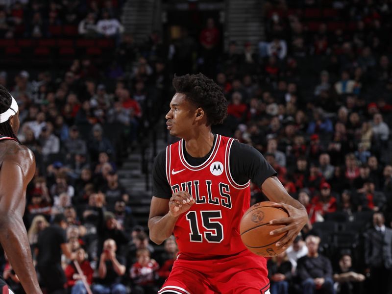 PORTLAND, OR - JANUARY 28: Julian Phillips #15 of the Chicago Bulls handles the ball during the game against the Portland Trail Blazers on January 28, 2024 at the Moda Center Arena in Portland, Oregon. NOTE TO USER: User expressly acknowledges and agrees that, by downloading and or using this photograph, user is consenting to the terms and conditions of the Getty Images License Agreement. Mandatory Copyright Notice: Copyright 2024 NBAE (Photo by Cameron Browne/NBAE via Getty Images)