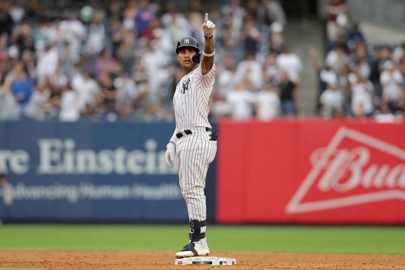 Aug 24, 2023; Bronx, New York, USA; New York Yankees left fielder Everson Pereira (80) reacts after hitting a double against the Washington Nationals during the eighth inning at Yankee Stadium. The hit was the first of his major league career. Mandatory Credit: Brad Penner-USA TODAY Sports