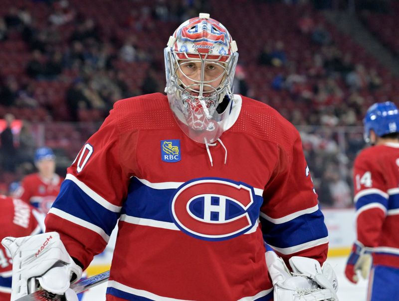 Apr 16, 2024; Montreal, Quebec, CAN; Montreal Canadiens goalie Cayden Primeau (30) skates during the warmup period before the game against the Detroit Red Wings at the Bell Centre. Mandatory Credit: Eric Bolte-USA TODAY Sports