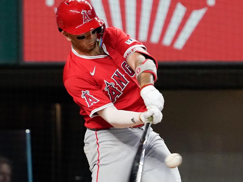 May 18, 2024; Arlington, Texas, USA; Los Angeles Angels shortstop Zach Neto (9) hits a double during the third inning against the Texas Rangers at Globe Life Field. Mandatory Credit: Raymond Carlin III-USA TODAY Sports