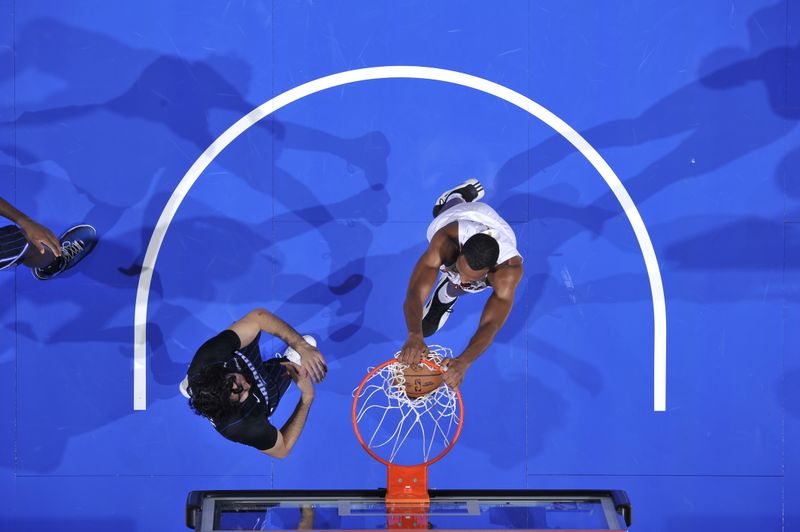 ORLANDO, FL - FEBRUARY 25:  Evan Mobley #4 of the Cleveland Cavaliers dunks the ball during the game against the Orlando Magic on February 25, 2025 at Kia Center in Orlando, Florida. NOTE TO USER: User expressly acknowledges and agrees that, by downloading and or using this photograph, User is consenting to the terms and conditions of the Getty Images License Agreement. Mandatory Copyright Notice: Copyright 2025 NBAE (Photo by Fernando Medina/NBAE via Getty Images)