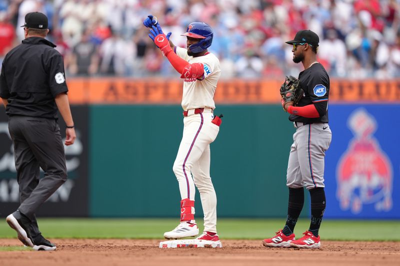 Apr 19, 2025; Philadelphia, Pennsylvania, USA; Philadelphia Phillies outfielder Johan Rojas (23) reacts after hitting a double against the Miami Marlins in the third inning at Citizens Bank Park. Mandatory Credit: Kyle Ross-Imagn Images