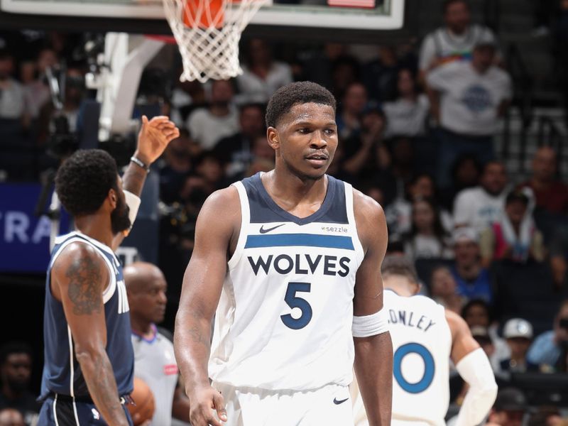 MINNEAPOLIS, MN -  OCTOBER 29: Anthony Edwards #5 of the Minnesota Timberwolves looks on during the game against the Dallas Mavericks on October 29, 2024 at Target Center in Minneapolis, Minnesota. NOTE TO USER: User expressly acknowledges and agrees that, by downloading and or using this Photograph, user is consenting to the terms and conditions of the Getty Images License Agreement. Mandatory Copyright Notice: Copyright 2024 NBAE (Photo by David Sherman/NBAE via Getty Images)