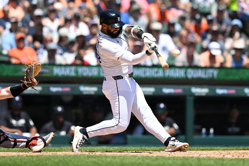 Jun 28, 2025; Detroit, Michigan, USA;  Detroit Tigers second baseman Gleyber Torres (25) hits a two-run home run against the Minnesota Twins in the fourth inning at Comerica Park. Mandatory Credit: Lon Horwedel-Imagn Images