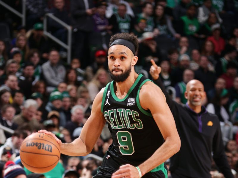 BOSTON, MA - FEBRUARY 3: Derrick White #9 of the Boston Celtics drives to the basket during the game against the Phoenix Suns on February 3, 2023 at TD Garden in Boston, Massachusetts.  NOTE TO USER: User expressly acknowledges and agrees that, by downloading and or using this photograph, User is consenting to the terms and conditions of the Getty Images License Agreement. Mandatory Copyright Notice: Copyright 2022 NBAE  (Photo by Nathaniel S. Butler/NBAE via Getty Images)