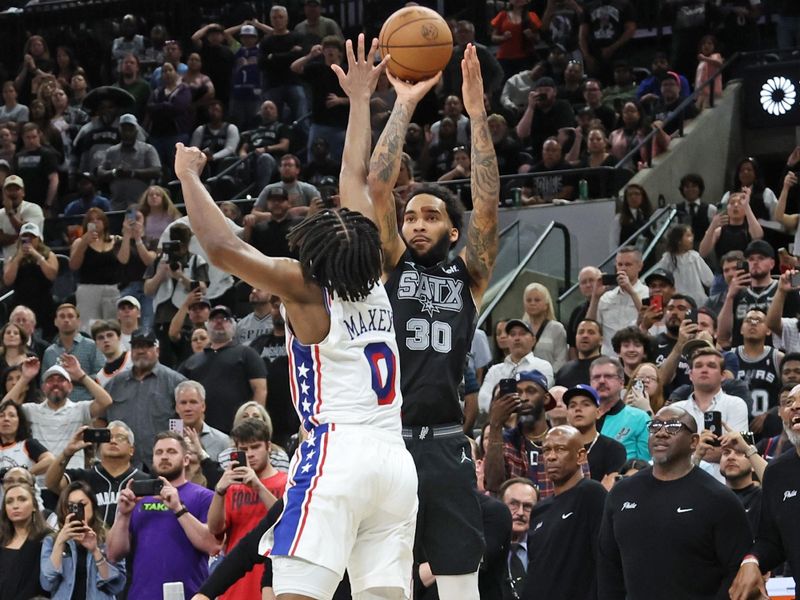 SAN ANTONIO, TX - APRIL 7: Julian Champagnie #30 of the San Antonio Spurs scores the go ahead 3 point basket during the game against the Philadelphia 76ers on April 7, 2024 at the Frost Bank Center in San Antonio, Texas. NOTE TO USER: User expressly acknowledges and agrees that, by downloading and or using this photograph, user is consenting to the terms and conditions of the Getty Images License Agreement. Mandatory Copyright Notice: Copyright 2024 NBAE (Photos by Tim Heitman/NBAE via Getty Images)