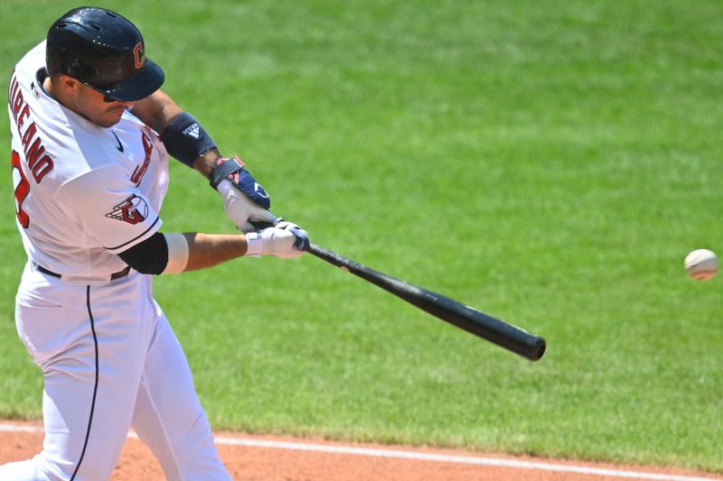 Aug 20, 2023; Cleveland, Ohio, USA; Cleveland Guardians center fielder Ramon Laureano (10) hits an RBI single in the fourth inning against the Detroit Tigers at Progressive Field. Mandatory Credit: David Richard-USA TODAY Sports