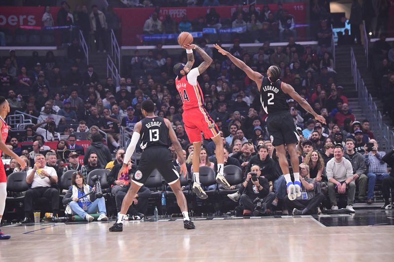 LOS ANGELES, CA - FEBRUARY 7: Brandon Ingram #14 of the New Orleans Pelicans shoots the ball against Kawhi Leonard #2 of the LA Clippers during the game on February 7, 2024 at Crypto.Com Arena in Los Angeles, California. NOTE TO USER: User expressly acknowledges and agrees that, by downloading and/or using this Photograph, user is consenting to the terms and conditions of the Getty Images License Agreement. Mandatory Copyright Notice: Copyright 2024 NBAE (Photo by Adam Pantozzi/NBAE via Getty Images)