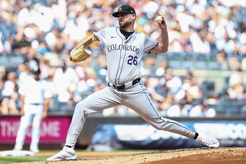 Aug 25, 2024; Bronx, New York, USA;  Colorado Rockies pitcher Austin Gomber (26) pitches in the first inning against the New York Yankees at Yankee Stadium. Mandatory Credit: Wendell Cruz-USA TODAY Sports