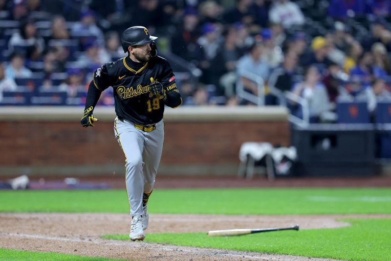 May 14, 2025; New York City, New York, USA; Pittsburgh Pirates third baseman Jared Triolo (19) watches his two run home run against the New York Mets during the fifth inning at Citi Field. Mandatory Credit: Brad Penner-Imagn Images