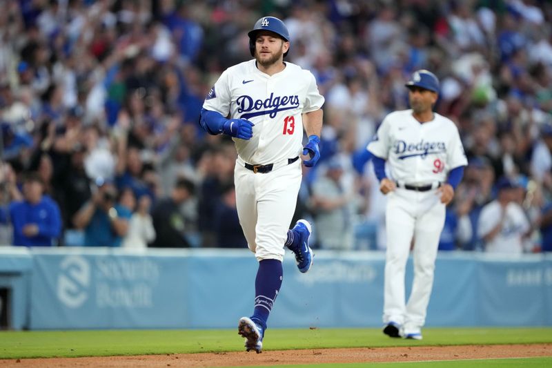 May 7, 2024; Los Angeles, California, USA; Los Angeles Dodgers third baseman Max Muncy (13) runs the bases after hitting a grand slam in the first inning against the Miami Marlins at Dodger Stadium. Mandatory Credit: Kirby Lee-USA TODAY Sports