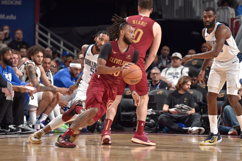 CLEVELAND, OH - FEBRUARY 27: Darius Garland #10 of the Cleveland Cavaliers dribbles the ball during the game against the Dallas Mavericks on February 27, 2024 at Rocket Mortgage FieldHouse in Cleveland, Ohio. NOTE TO USER: User expressly acknowledges and agrees that, by downloading and/or using this Photograph, user is consenting to the terms and conditions of the Getty Images License Agreement. Mandatory Copyright Notice: Copyright 2024 NBAE (Photo by David Liam Kyle/NBAE via Getty Images)