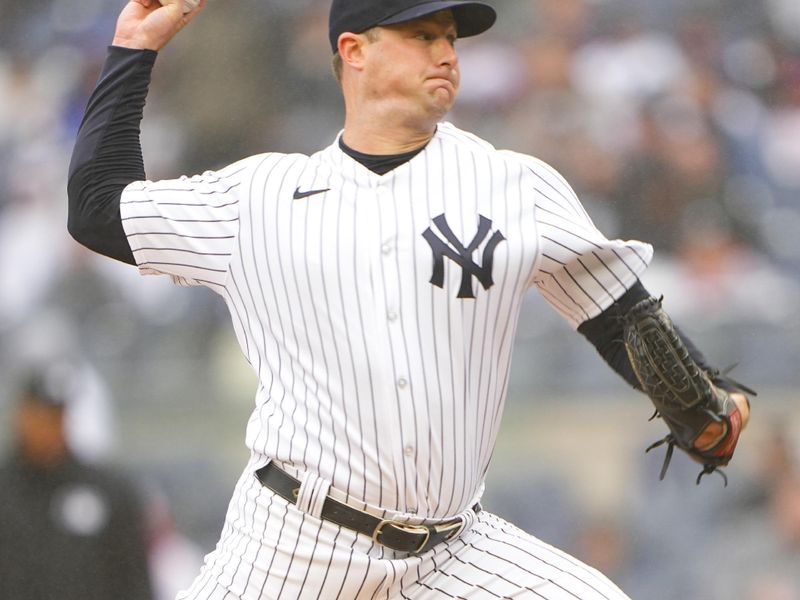 Apr 5, 2023; Bronx, New York, USA;  New York Yankees pitcher Gerrit Cole (45) delivers a pitch against the Philadelphia Phillies during the first inning at Yankee Stadium. Mandatory Credit: Gregory Fisher-USA TODAY Sports