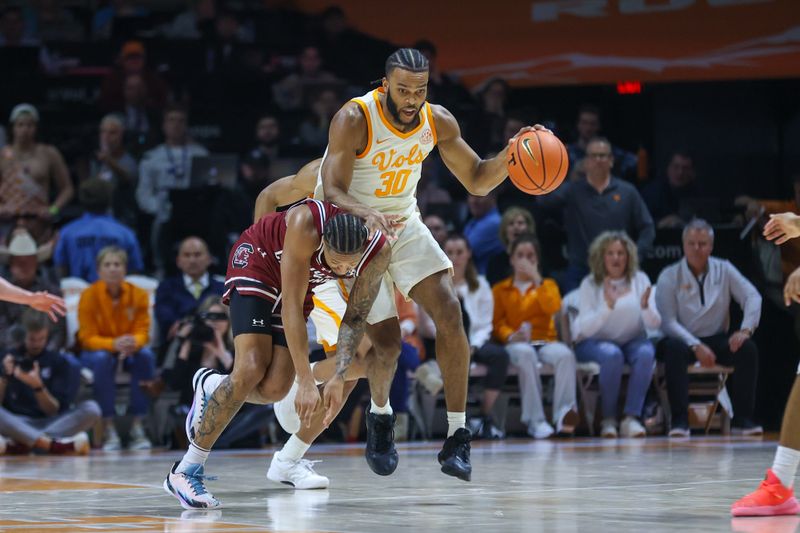 Jan 30, 2024; Knoxville, Tennessee, USA; Tennessee Volunteers guard Josiah-Jordan James (30) brings the ball up court against the South Carolina Gamecocks during the second half at Thompson-Boling Arena at Food City Center. Mandatory Credit: Randy Sartin-USA TODAY Sports