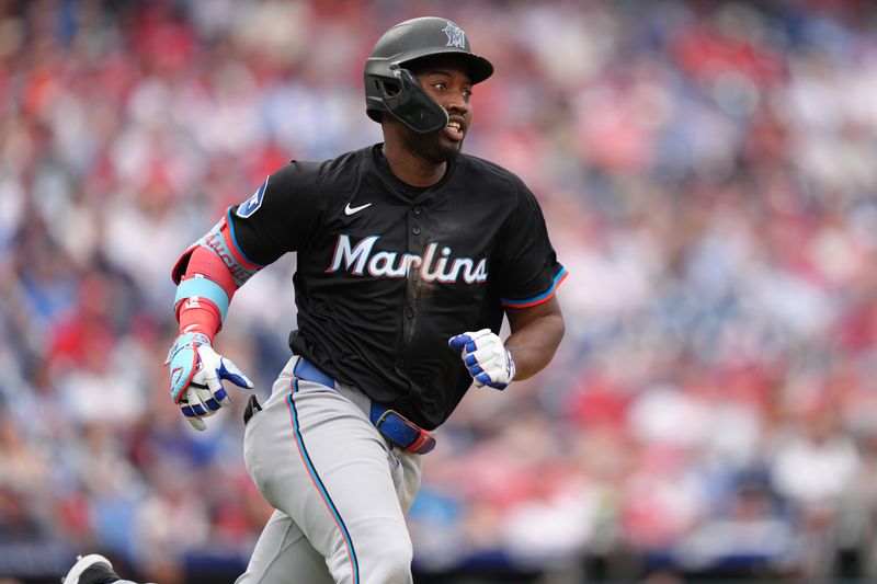 Apr 19, 2025; Philadelphia, Pennsylvania, USA; Miami Marlins outfielder Jesus Sanchez (7) runs toward first after hitting a double against the Philadelphia Phillies in the ninth inning at Citizens Bank Park. Mandatory Credit: Kyle Ross-Imagn Images