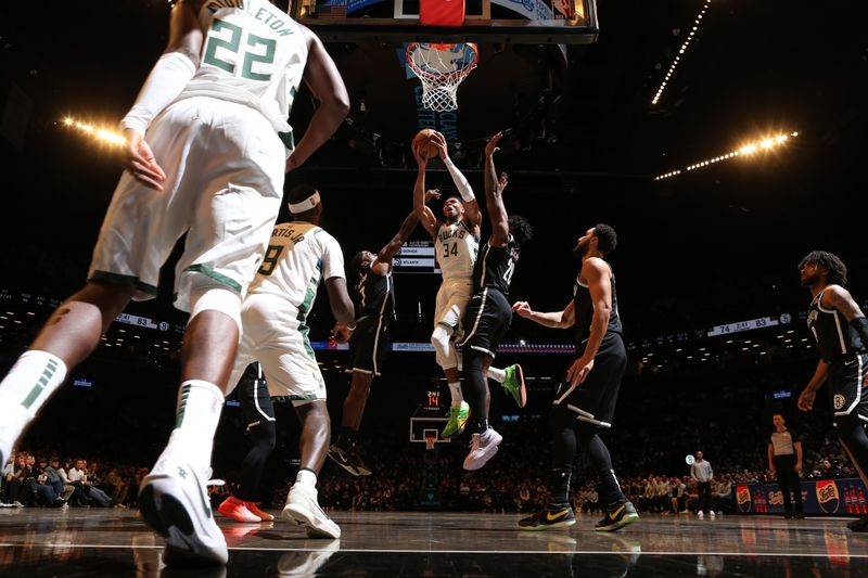 BROOKLYN, NY - DECEMBER 8: Giannis Antetokounmpo #34 of the Milwaukee Bucks shoots the ball during the game against the Brooklyn Nets on December 8, 2024 at Barclays Center in Brooklyn, New York. NOTE TO USER: User expressly acknowledges and agrees that, by downloading and or using this Photograph, user is consenting to the terms and conditions of the Getty Images License Agreement. Mandatory Copyright Notice: Copyright 2024 NBAE (Photo by Nathaniel S. Butler/NBAE via Getty Images)