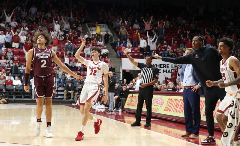 Feb 3, 2024; Tuscaloosa, Alabama, USA; Alabama guard Kai Spears (32) watches his three pointer fall in at Coleman Coliseum. Alabama defeated Mississippi State 99-67. Spears, a walk on, was granted a scholarship earlier in the week. Mandatory Credit: Gary Cosby Jr.-USA TODAY Sports