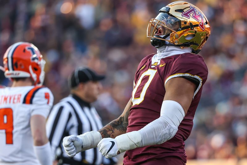 Nov 4, 2023; Minneapolis, Minnesota, USA; Minnesota Golden Gophers defensive lineman Anthony Smith (0) celebrates a tackle against the Illinois Fighting Illini during the second half at Huntington Bank Stadium. Mandatory Credit: Matt Krohn-USA TODAY Sports