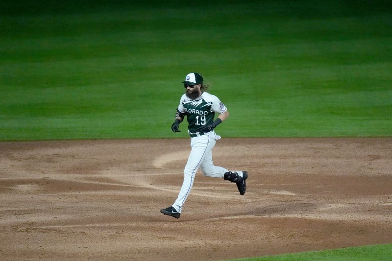 Aug 19, 2023; Denver, Colorado, USA; Colorado Rockies designated hitter Charlie Blackmon (19) runs off his two run home run in the seventh inning against the Chicago White Sox at Coors Field. Mandatory Credit: Ron Chenoy-USA TODAY Sports