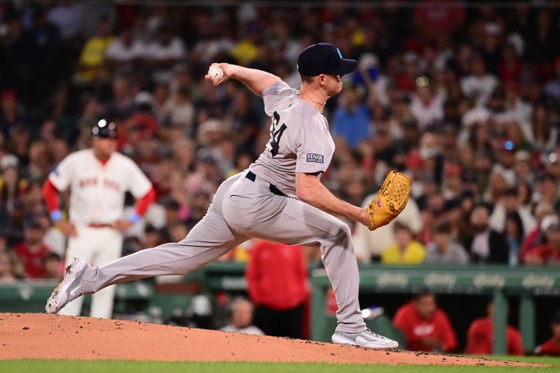 Jun 16, 2024; Boston, Massachusetts, USA; New York Yankees relief pitcher Caleb Ferguson (64) pitches against the Boston Red Sox during the seventh inning at Fenway Park. Mandatory Credit: Eric Canha-USA TODAY Sports