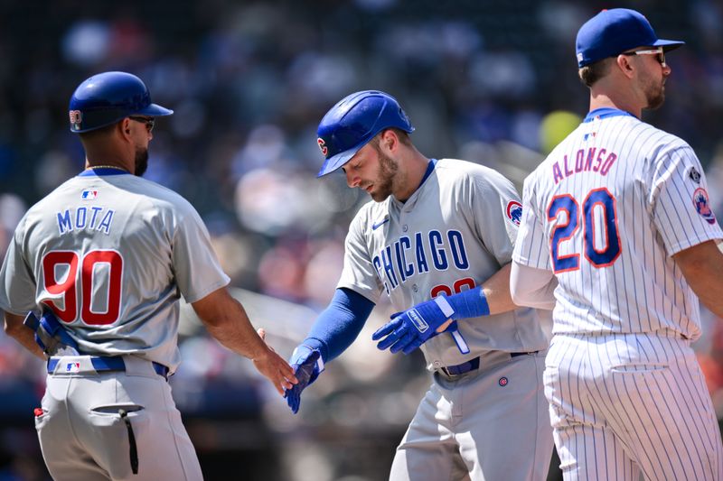 May 2, 2024; New York City, New York, USA; Chicago Cubs first baseman Michael Busch (29) reacts after hitting a single against the New York Mets during the fourth inning at Citi Field. Mandatory Credit: John Jones-USA TODAY Sports