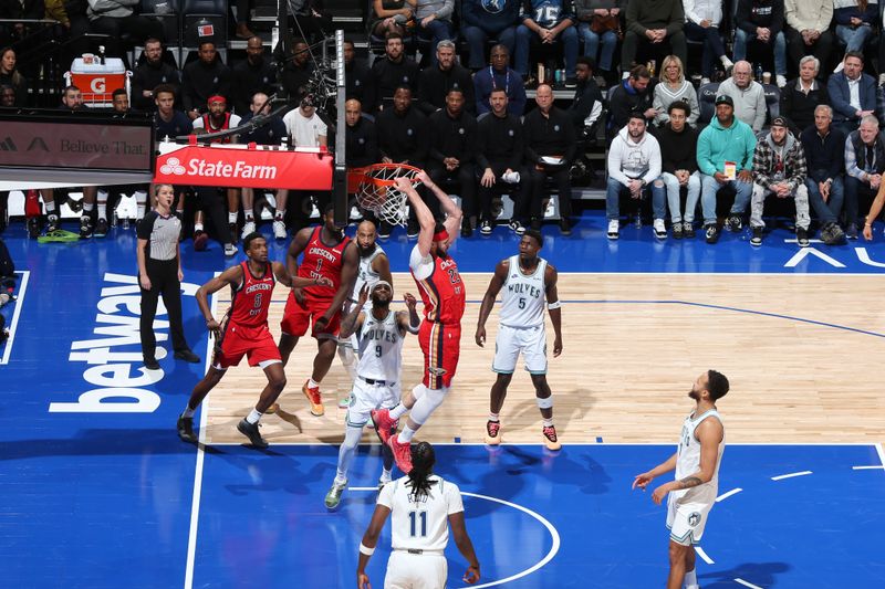 MINNEAPOLIS, MN -  JANUARY 3: Larry Nance Jr. #22 of the New Orleans Pelicans dunks the ball during the game against the Minnesota Timberwolves on January 3, 2024 at Target Center in Minneapolis, Minnesota. NOTE TO USER: User expressly acknowledges and agrees that, by downloading and or using this Photograph, user is consenting to the terms and conditions of the Getty Images License Agreement. Mandatory Copyright Notice: Copyright 2024 NBAE (Photo by David Sherman/NBAE via Getty Images)