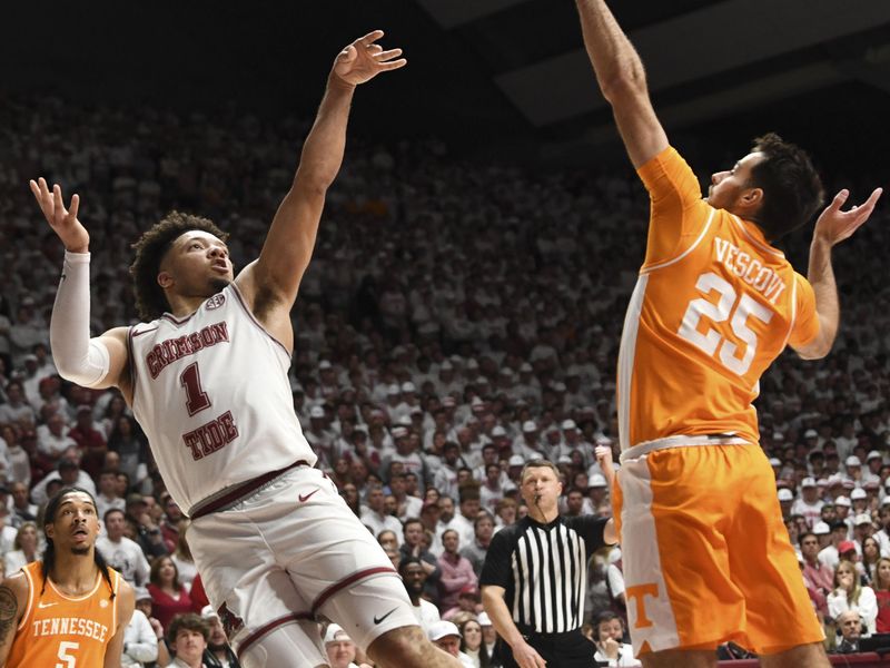 Mar 2, 2024; Tuscaloosa, Alabama, USA; Alabama guard Mark Sears (1) shoots over Tennessee guard Santiago Vescovi (25) at Coleman Coliseum. Tennessee defeated Alabama 81-74. Mandatory Credit: Gary Cosby Jr.-USA TODAY Sports