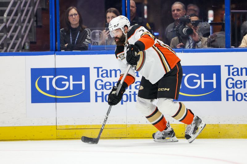 Jan 13, 2024; Tampa, Florida, USA; Anaheim Ducks defenseman Radko Gudas (7) controls the puck against the Tampa Bay Lightning in the first period at Amalie Arena. Mandatory Credit: Nathan Ray Seebeck-USA TODAY Sports