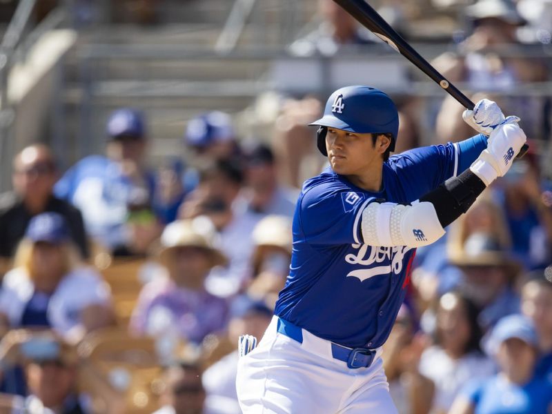 Mar 3, 2024; Phoenix, Arizona, USA; Los Angeles Dodgers designated hitter Shohei Ohtani against the Colorado Rockies during a spring training game at Camelback Ranch-Glendale. Mandatory Credit: Mark J. Rebilas-USA TODAY Sports