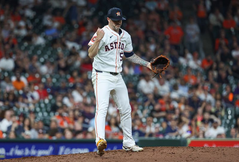 May 1, 2024; Houston, Texas, USA;  Houston Astros pitcher Ryan Pressly (55) reacts after a strikeout during the ninth inning against the Cleveland Guardians at Minute Maid Park. Mandatory Credit: Troy Taormina-USA TODAY Sports